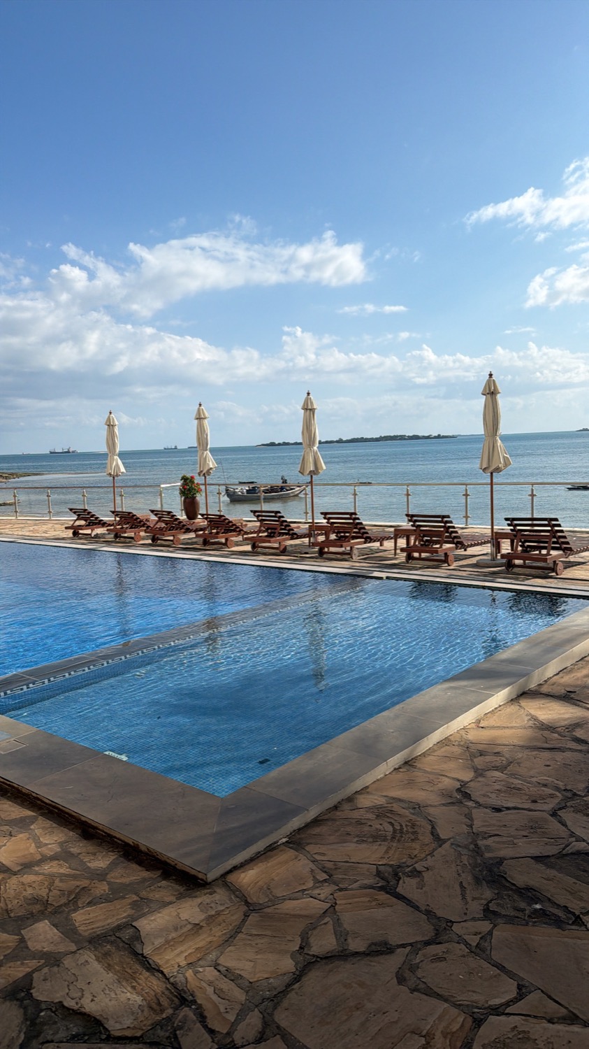 Poolside view facing the ocean in Zanzibar