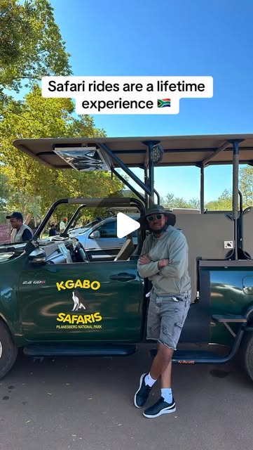 Johannesburg safari reel beside a game drive vehicle